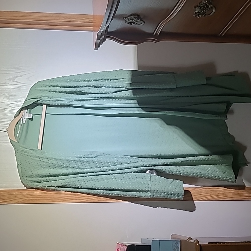 Light green jacket with dots